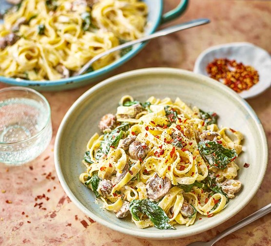 Creamy mushroom & spinach pasta served in a bowl