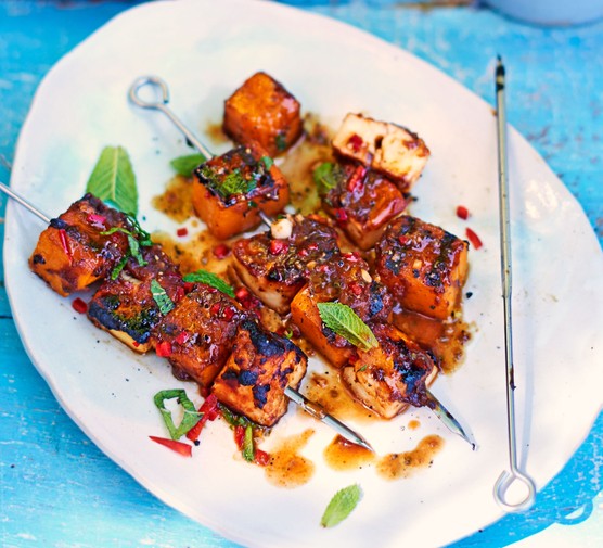 Vegetarian marinated skewers on a oval plate