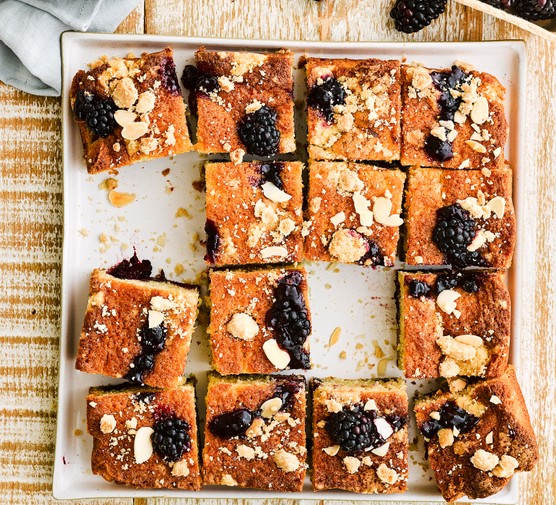 Jammy blackberry and almond slice cut into squares