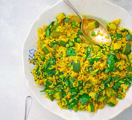 A bowl with curried spring veggie pilaf