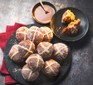 A selection of mini hot cross bun doughnuts