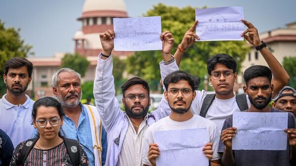 NEET aspirants assembles within the precinct of Supreme court of India during a hearing upon NEET Paper leak case in New Delhi, India, on Thursday, July 18, 2024. 