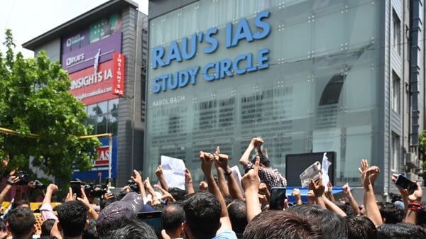 UPSC aspirants death:: Student UPSC aspirants protest out side Rau's Study Circle against the incident of last night flooding which claims three students lives at Old Rajinder Nagar