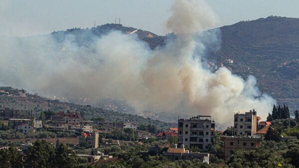 Smoke billows from a site targeted by the Israeli military in the southern Lebanese border village. File photo