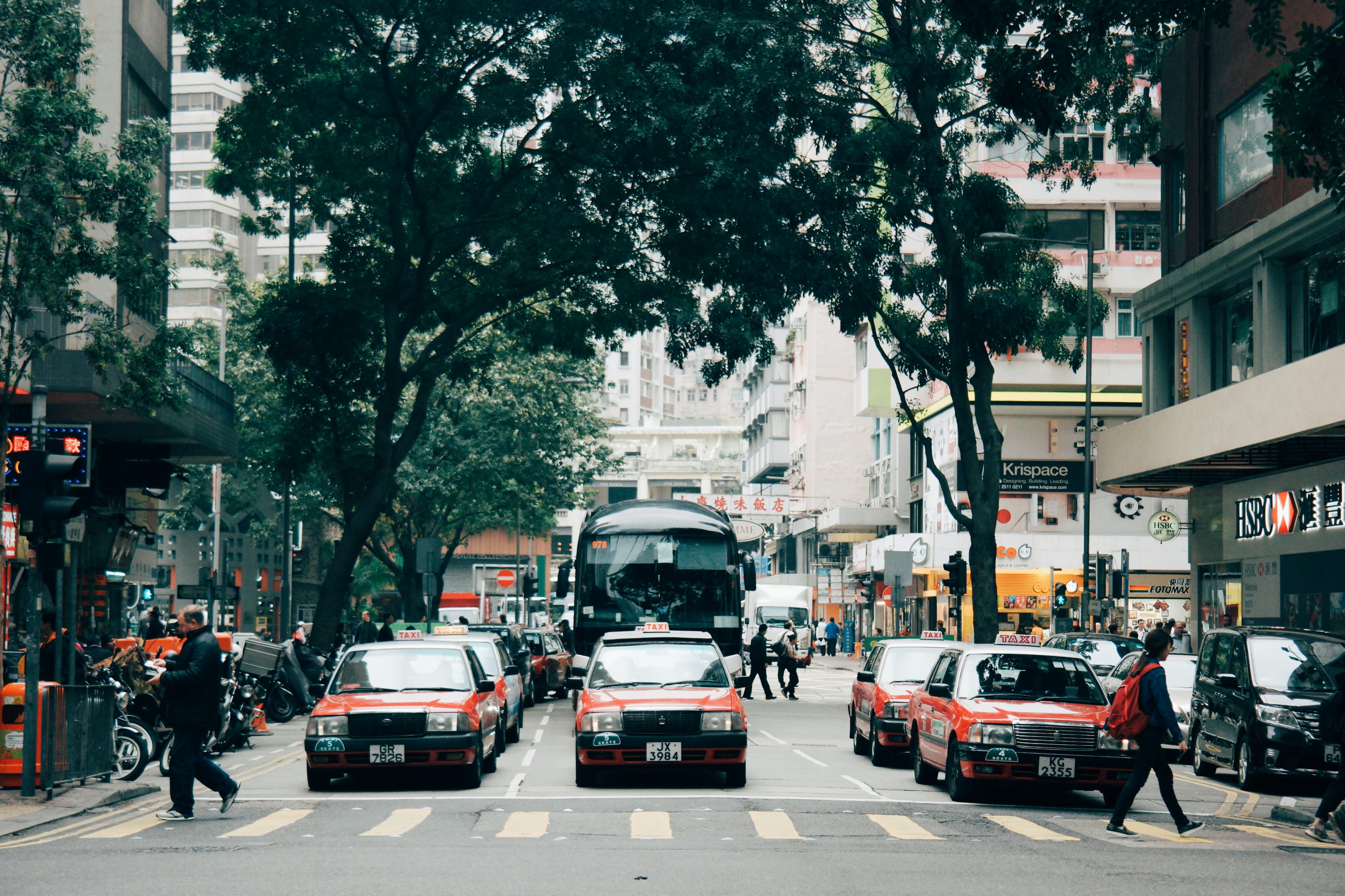 vehicles on road during daytime