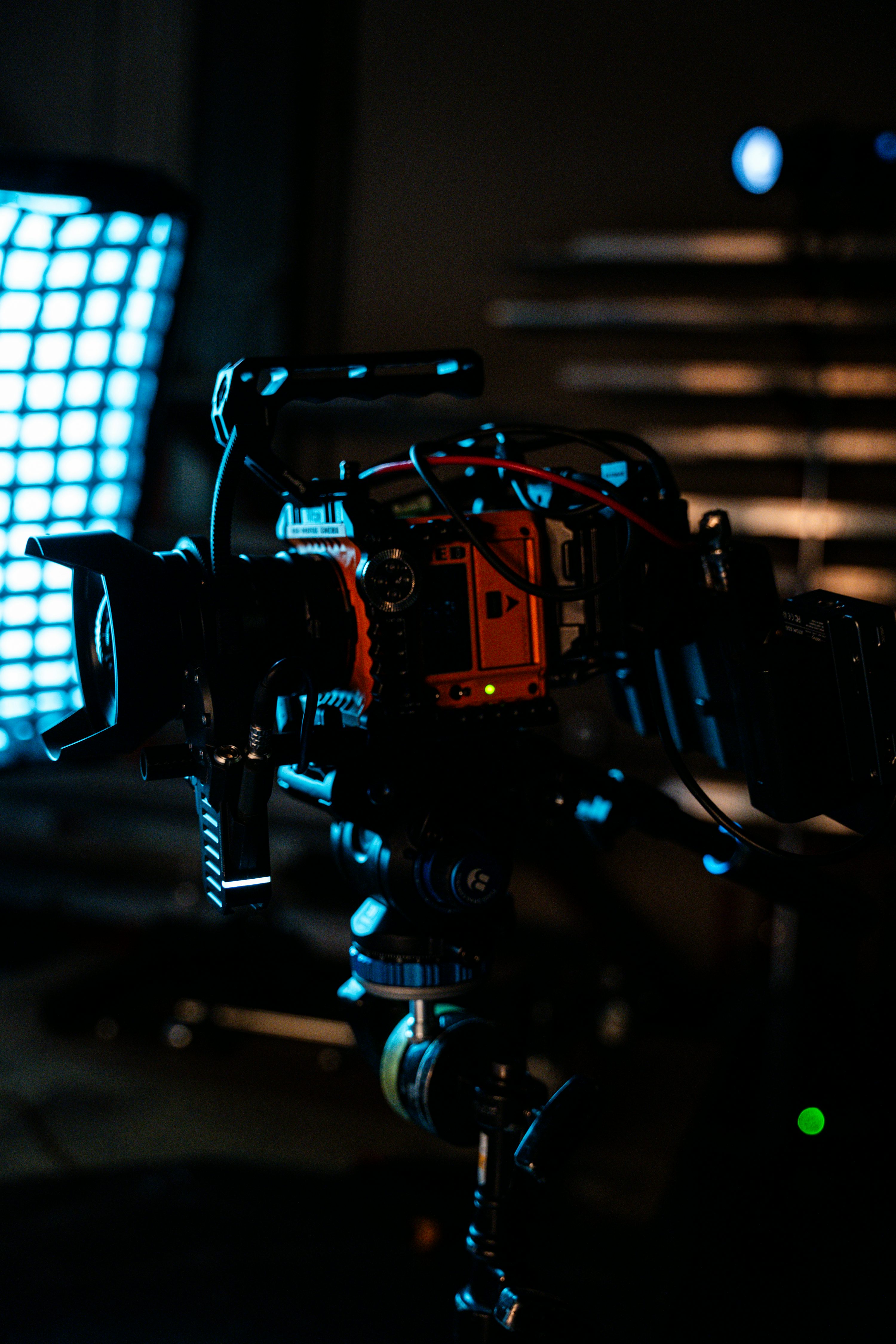 a camera set up in front of a television screen