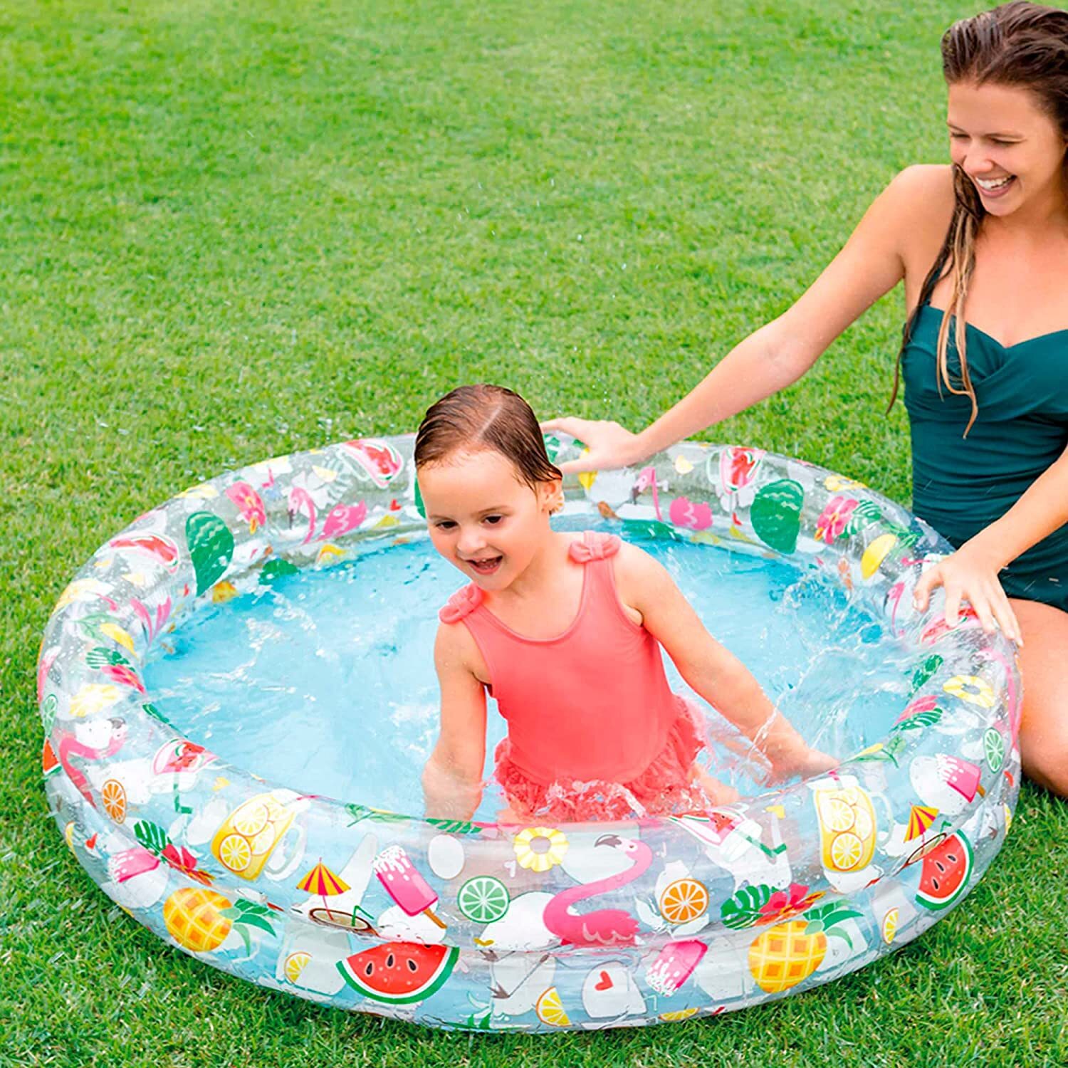 Toddler and parent enjoying the pool