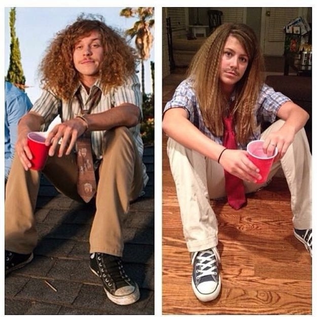 person with curly hair holding a red solo cup