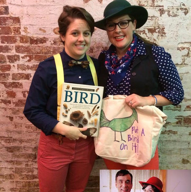 One person wearing suspenders and holding a book and one person wearing a polka dot shirt