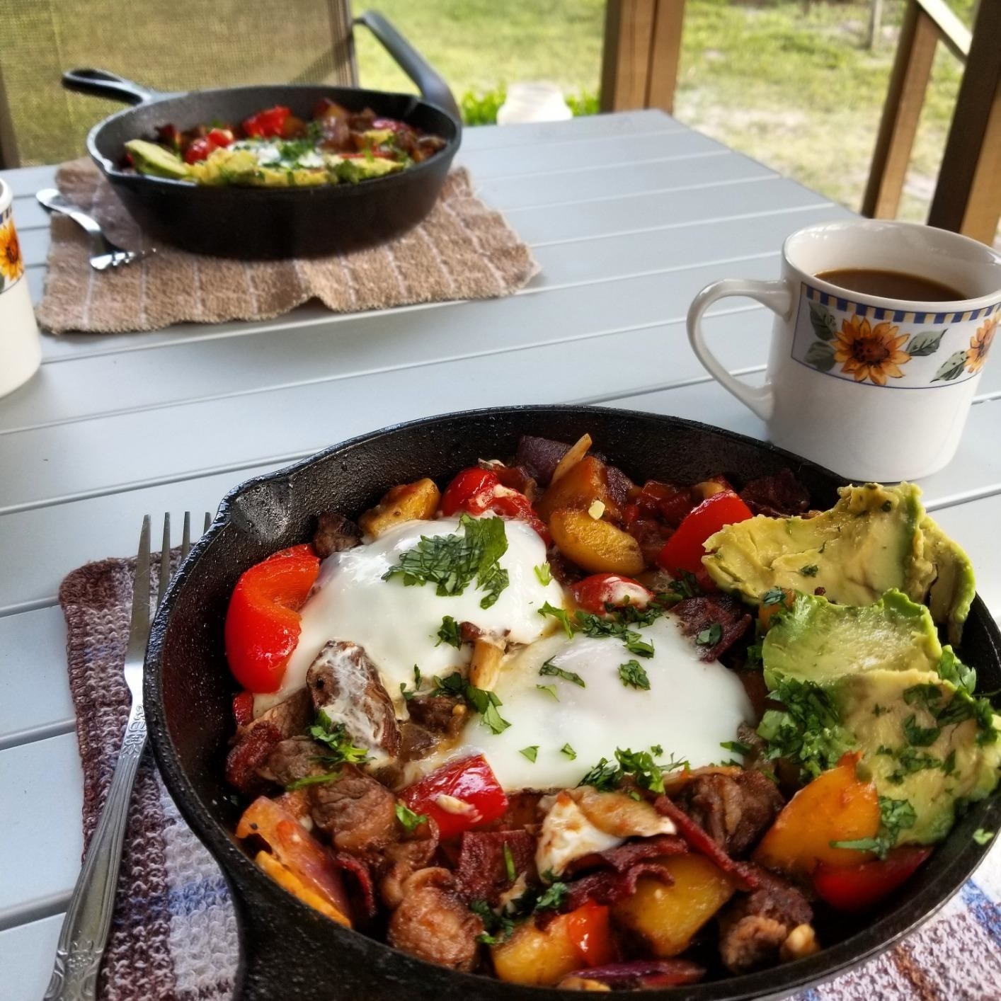 The cast-iron with a breakfast hash in it