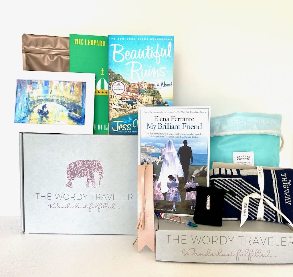 the wordy traveler box that comes with books and other knick knacks