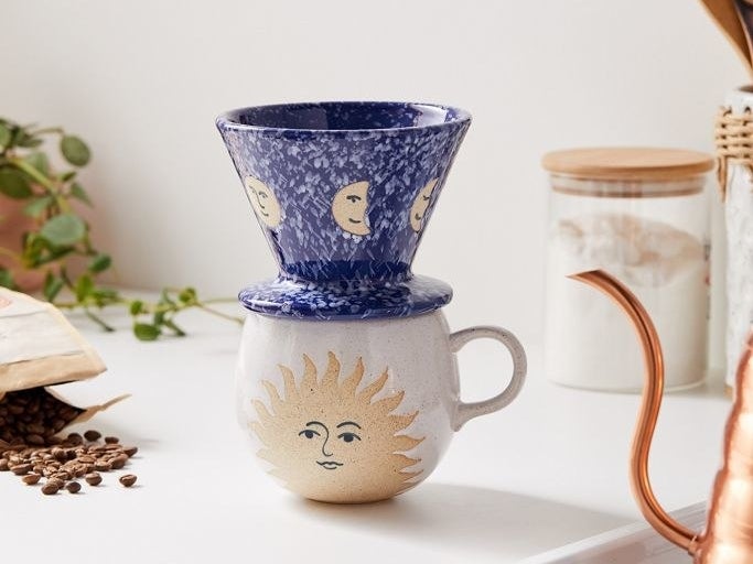 The celestial-themed set which comes with a blue pour over and white mug