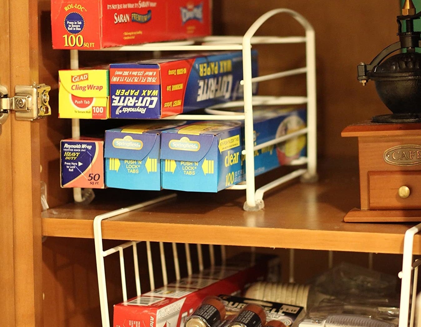 three tier little shelf holding different bag and foil boxes