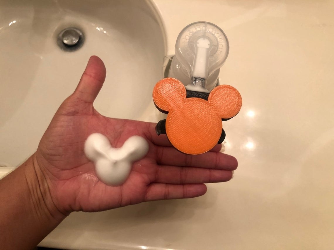 mickey mouse pump attachment that helps create mouse shaped foam 