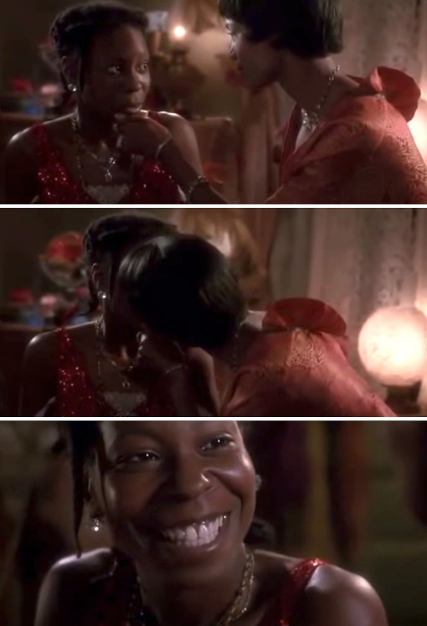 Shug kissing Celie for the first time, and Celie smiling happily in response