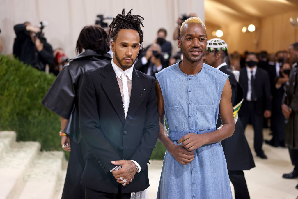 A close up of Kenneth Nicholson as he poses with Lewis Hamilton