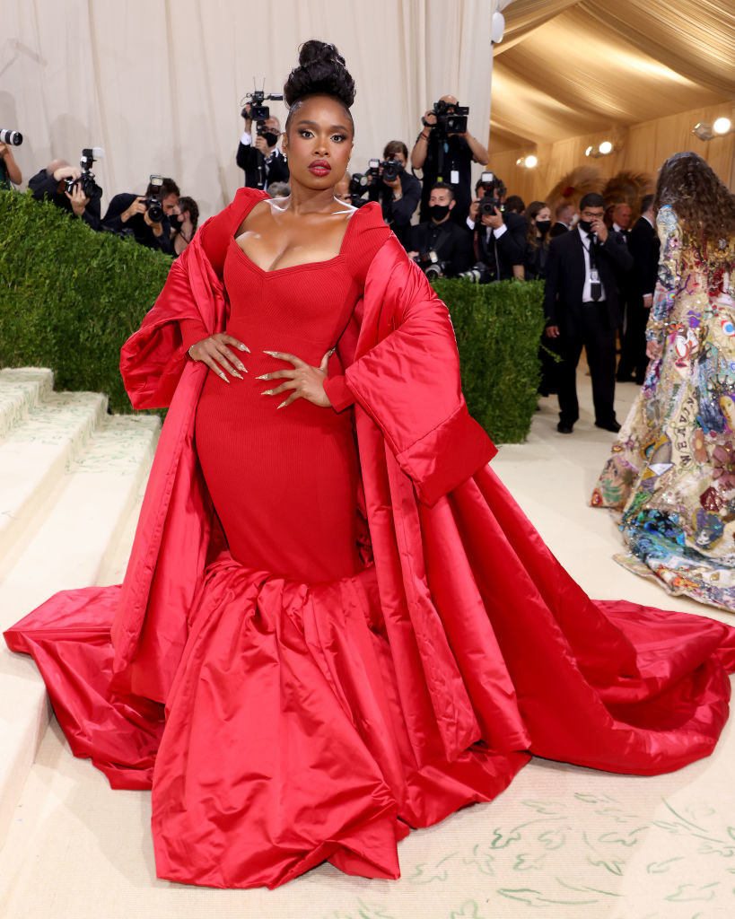 Jennifer Hudson wears a long sleeve gown with a mermaid train