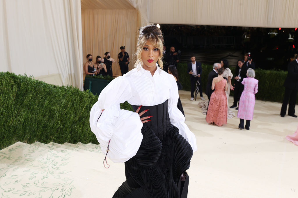 A close up of Mj Rodriguez as she poses on the Met steps