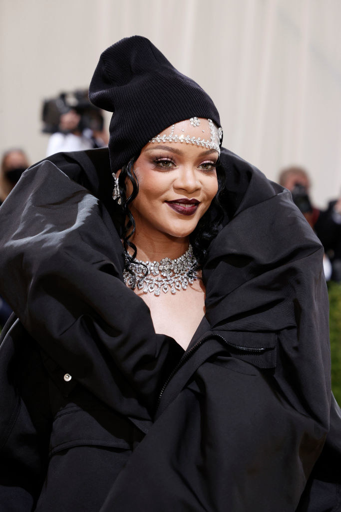 A close up of Rihanna&#x27;s dark makeup and beanie