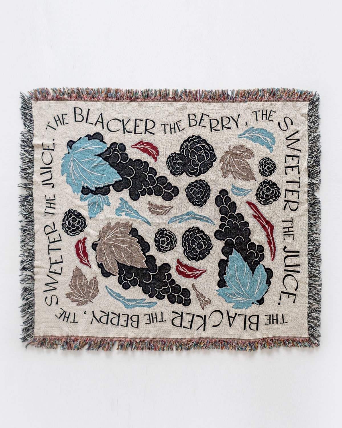 a blanket with blackberries and leaves on it with a boarder that says &quot;the blacker the berry the sweeter the juice&quot;