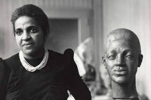 artist Selma Burke with one of her sculptures