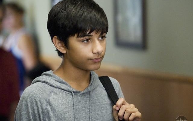 Mark Indelicato as &quot;Justin&quot; from Ugly Betty is pictured with a gray hoodie and backpack while he looks into the distance
