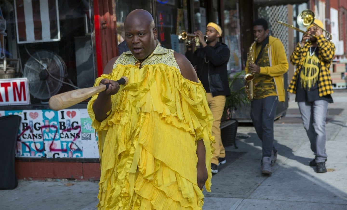 Tituss Burgess as &quot;Titus&quot; is doing a Beyoncé-inspired parody video (&quot;Lemonade&quot;), and he&#x27;s seen holding a bat wearing a frilly dress in Unbreakable Kimmy Schmidt