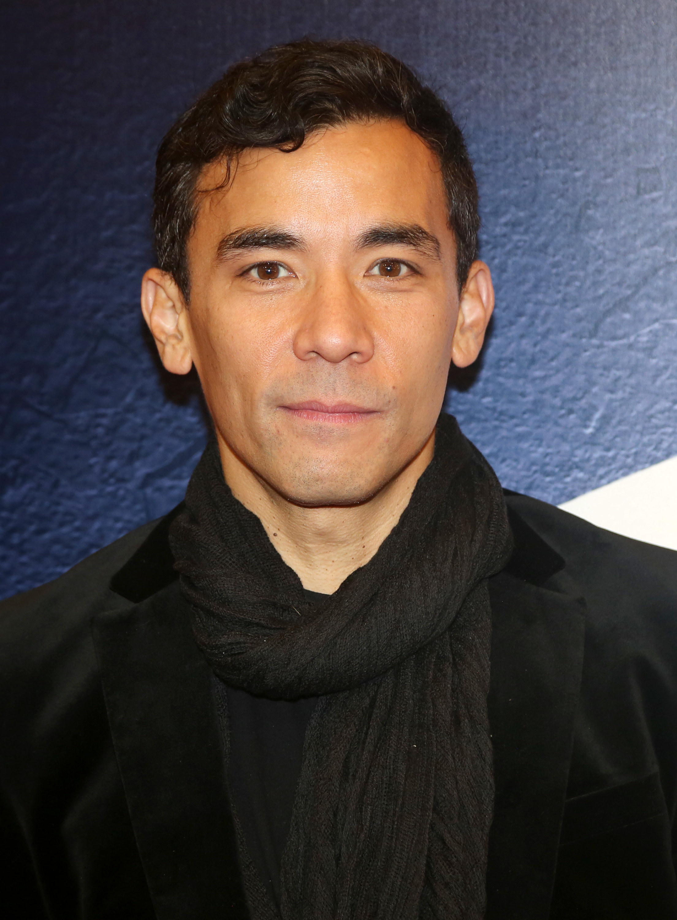 A closeup of Conrad Ricamora