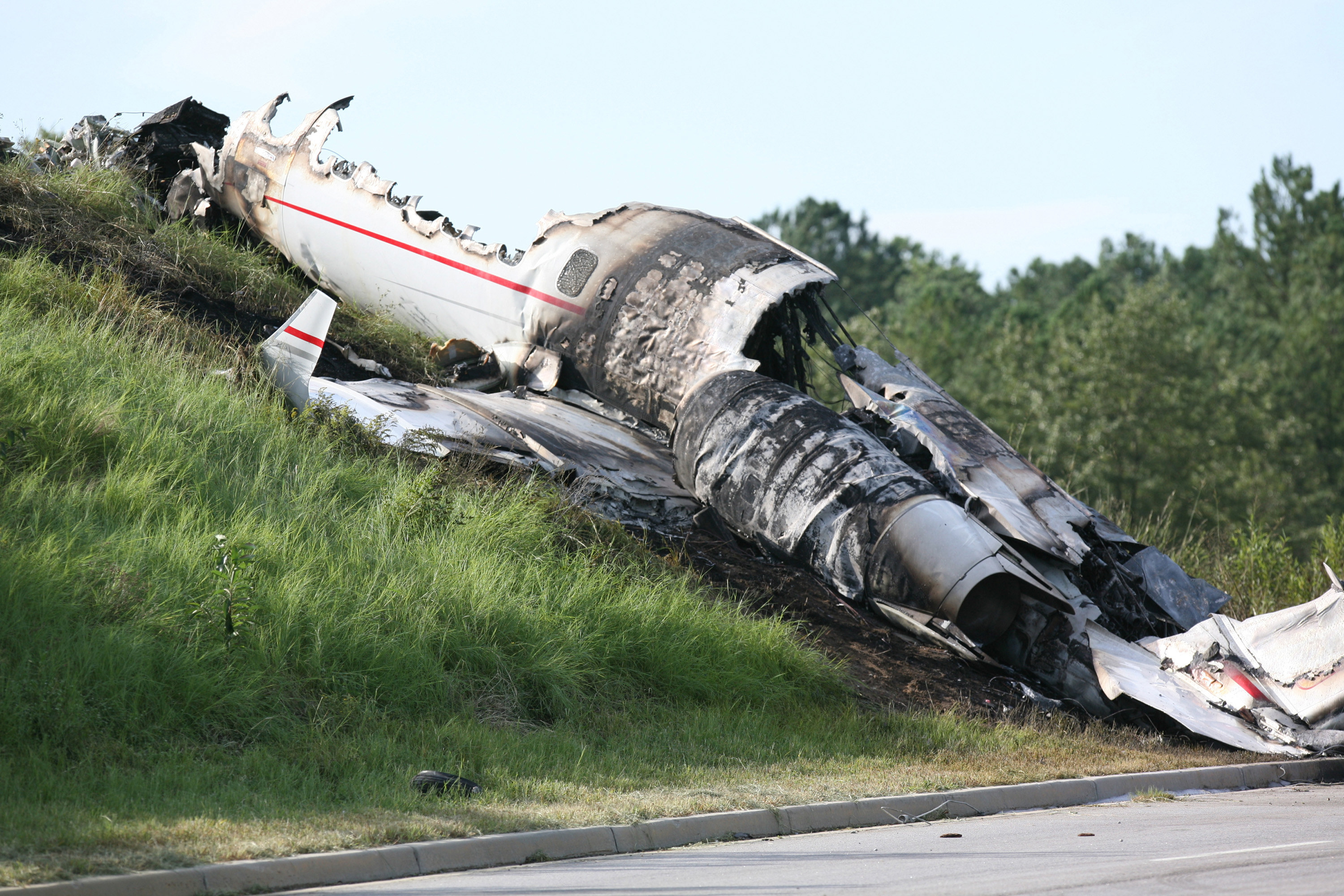 An image of the crashed, burnt plane