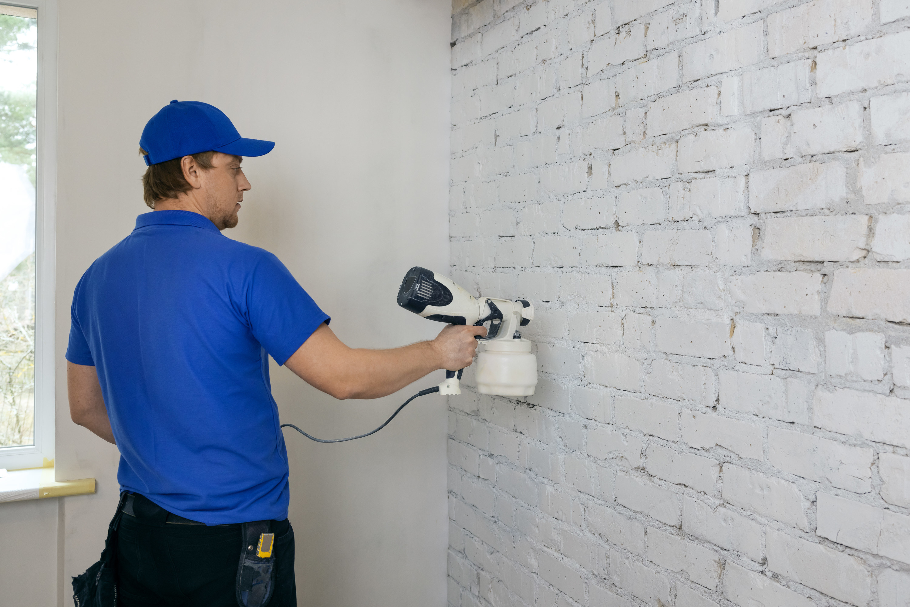 Painting a brick wall white