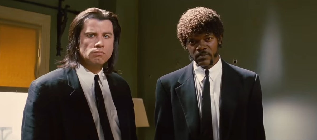 Vincent and Jules standing in an apartment suite in &quot;Pulp Fiction&quot;