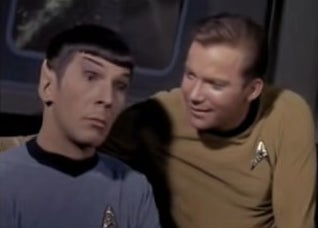 Captain Kirk with his arm around Mr. Spock in &quot;Star Trek&quot;