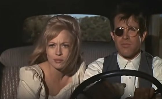 Bonnie and Clyde riding in a car together in &quot;Bonnie and Clyde&quot;