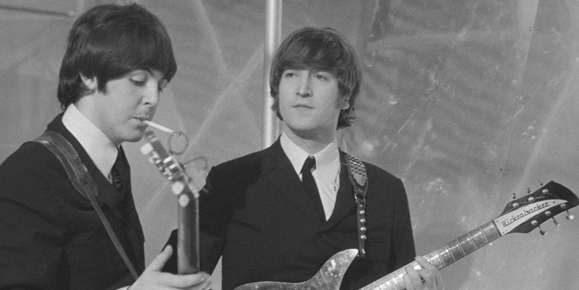 Musicians John Lennon (R) and Paul McCartney of English rock group The Beatles on the set of television special The Music of Lennon &amp;amp; McCartney at Granada Studios, Manchester, circa November 1965.