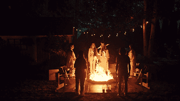 babies levitating over a fire