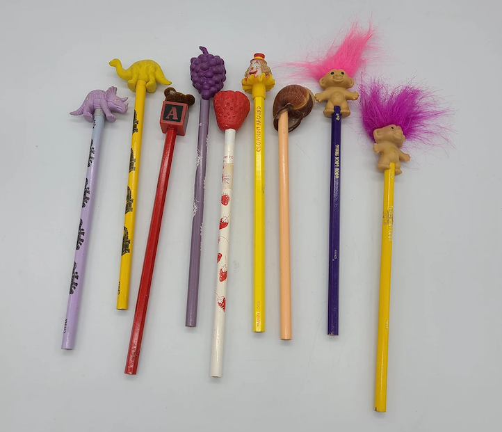 Pencils with pencil toppers