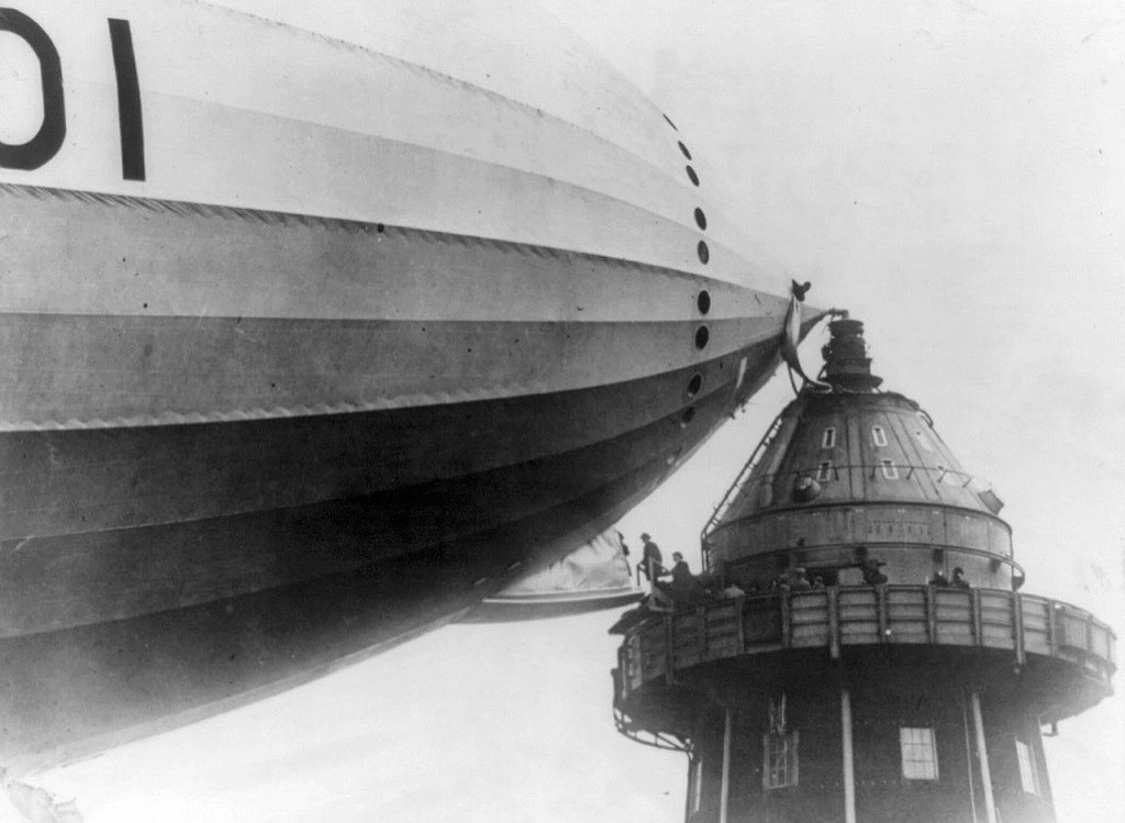 People boarding a blimp