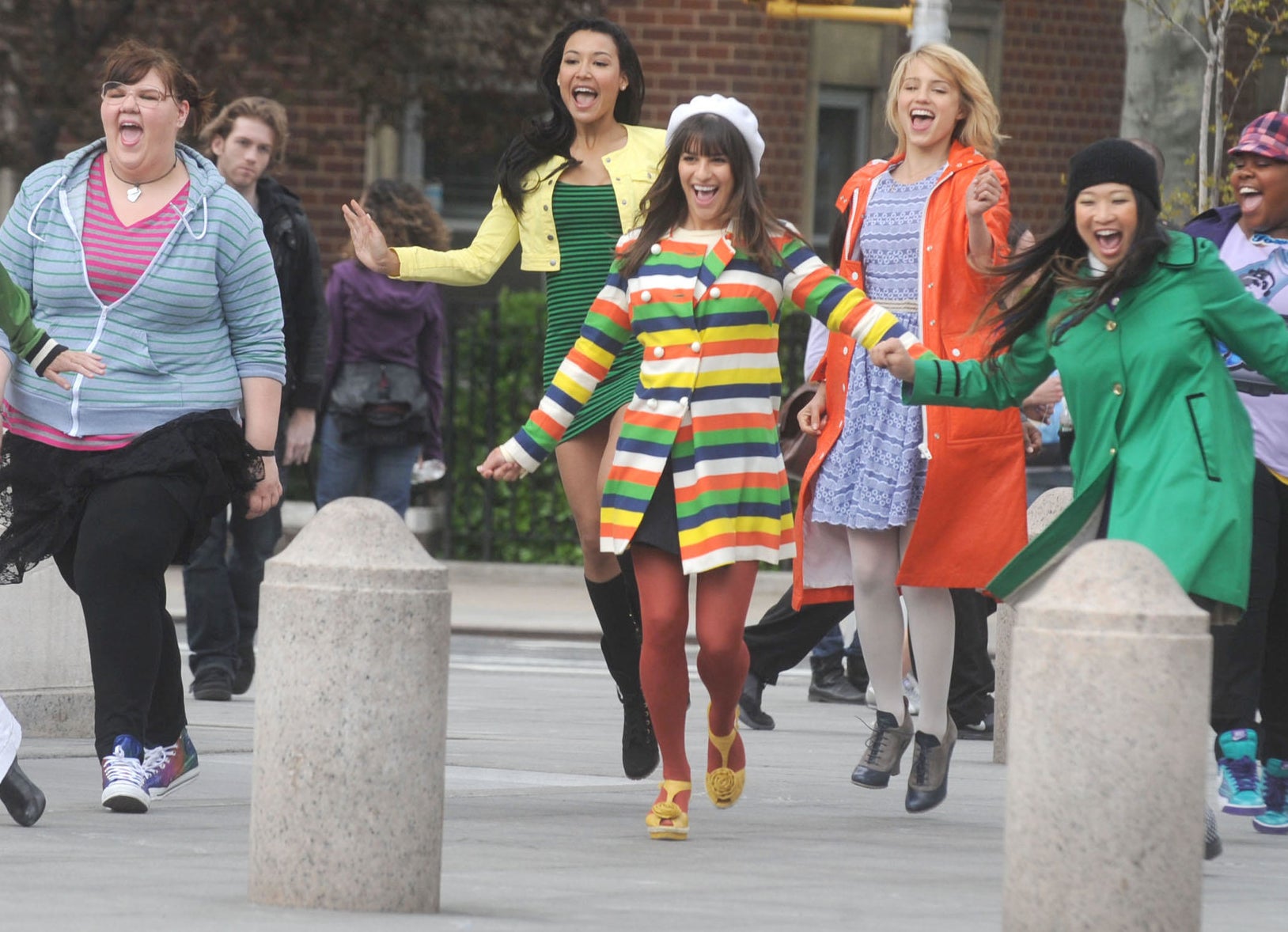 Lea Michele and the cast of Glee dance in New York City.