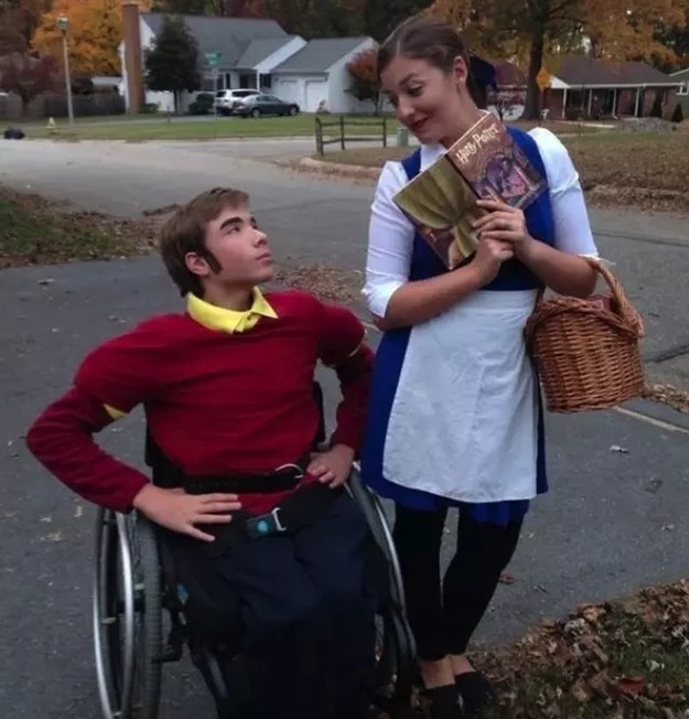 guy in a red shirt and girl in a blue dress with an apron