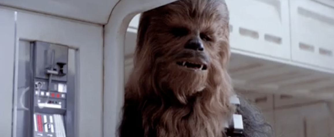 Chewbacca aboard the Millennium Falcon in a scene from Star Wars