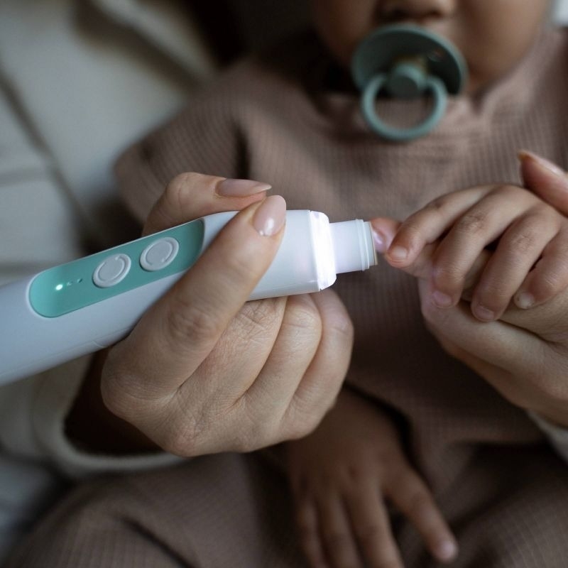 Child gets nails trimmed