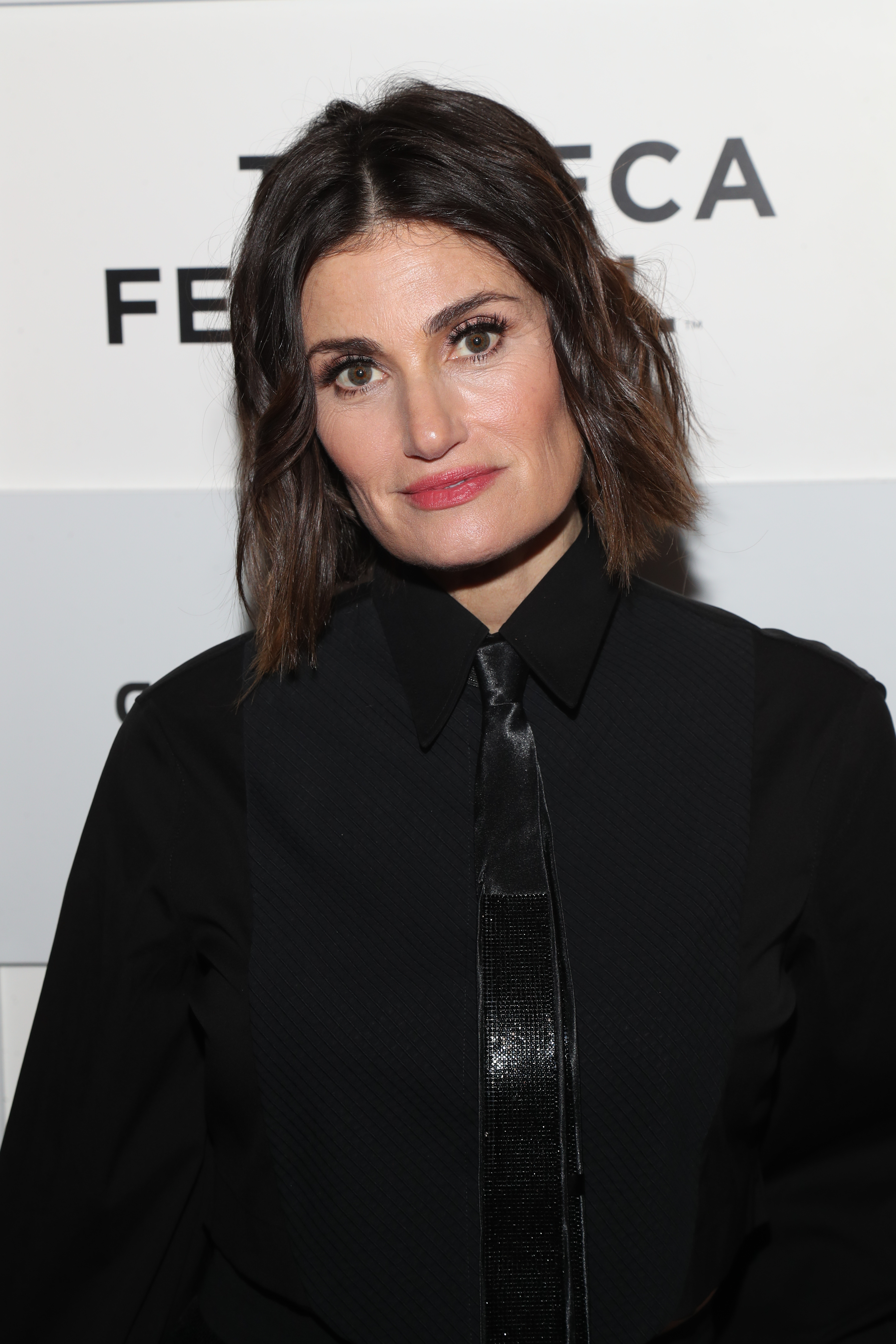 Close-up of Idina at a media event