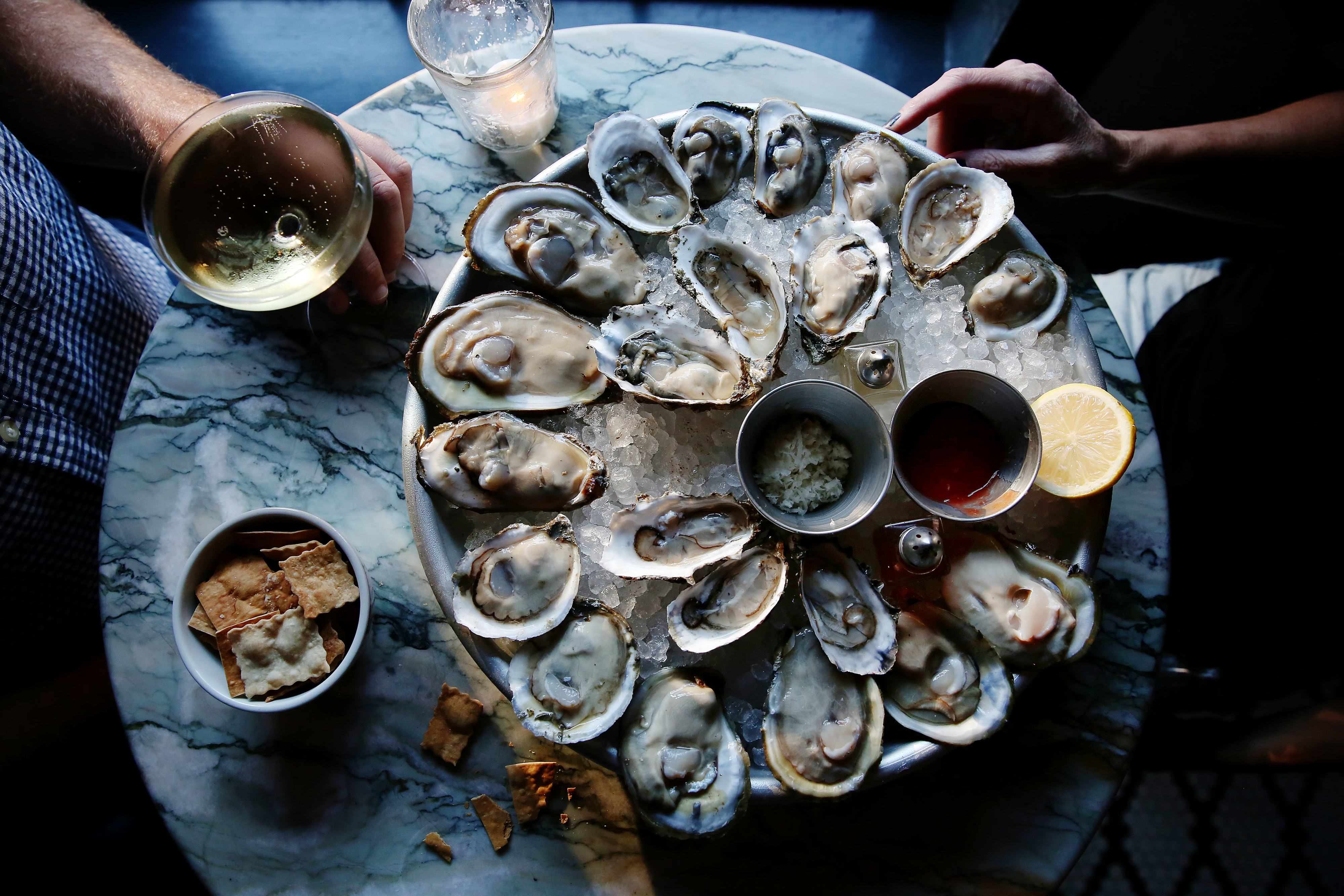 a plate of Raw oysters