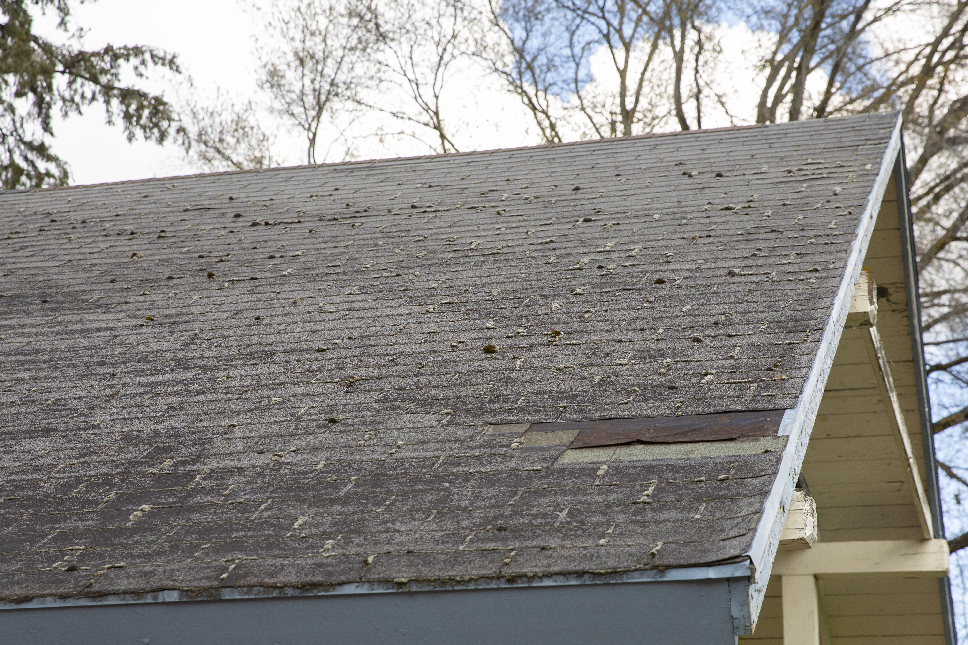 roof on a house in need of repair or replacement