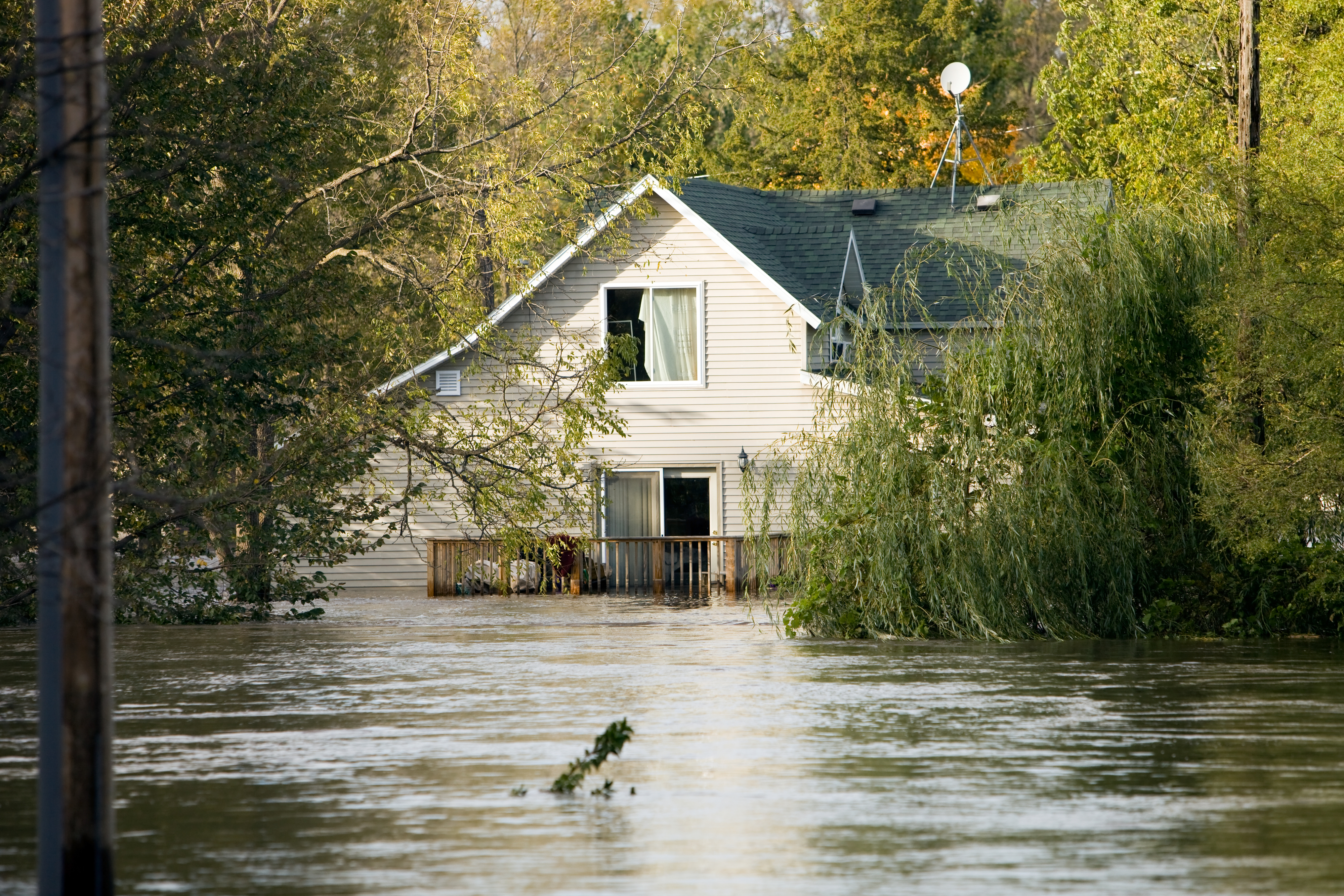 flooded house on a street