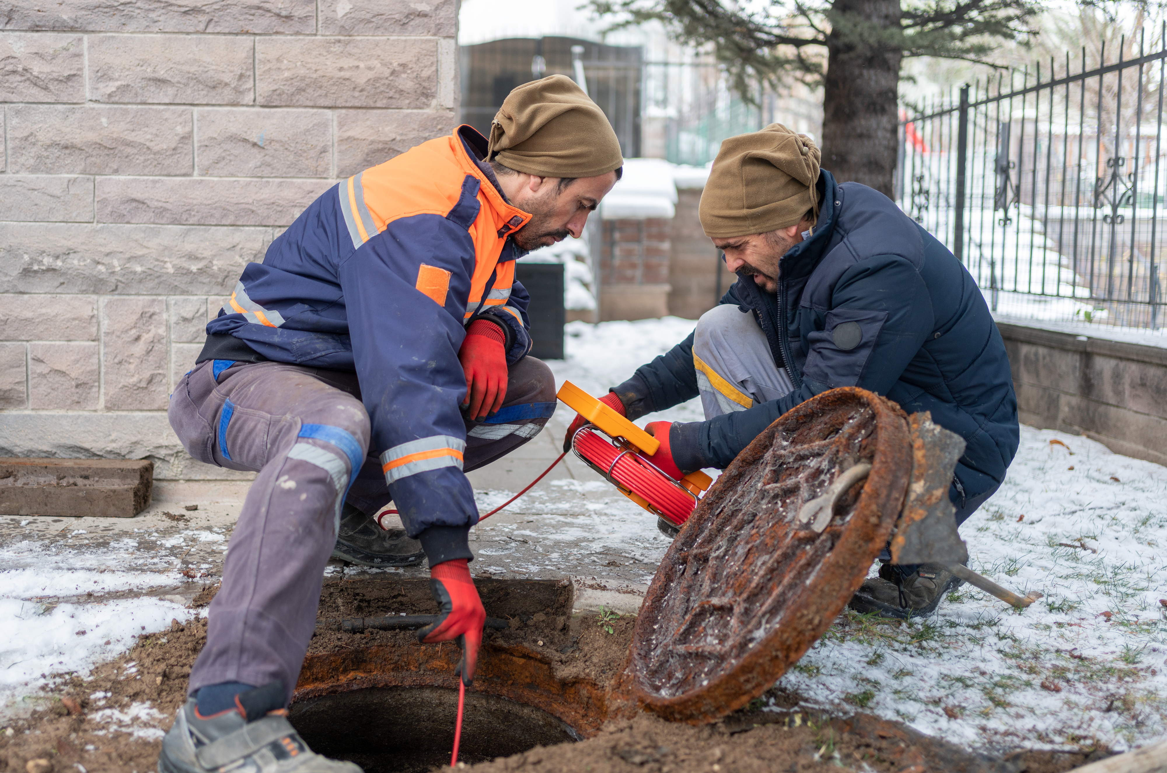 putting a camera line into a sewer in a home