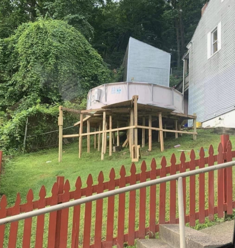 above ground pool placed on top of a deck