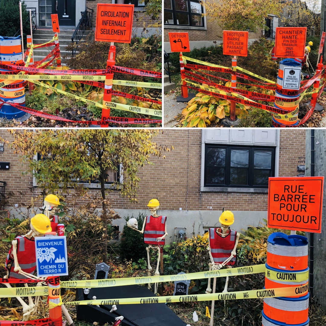 A section in front of a building is barred with caution tape; four skeletons in construction equipment are positioned as if they&#x27;re digging in the barred area