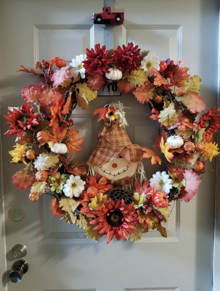 a leaf wreath on a door