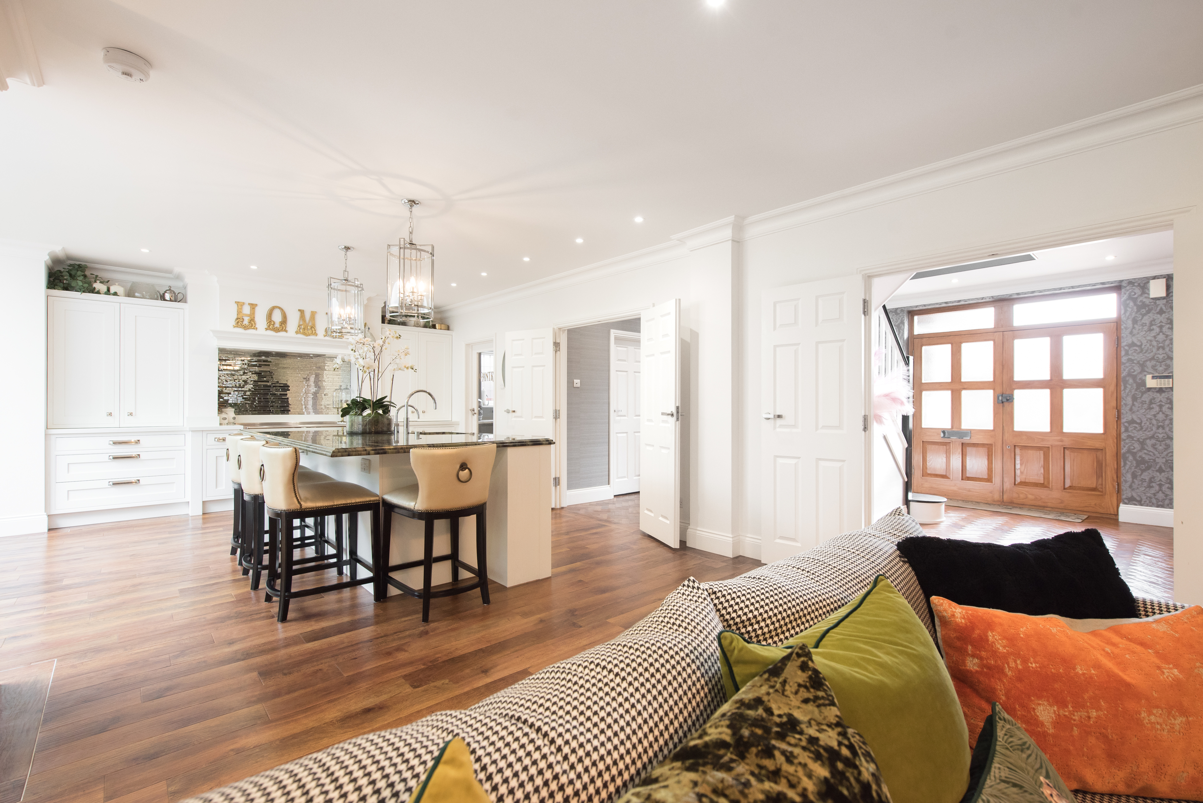 large connected kitchen and living room with open floor plan